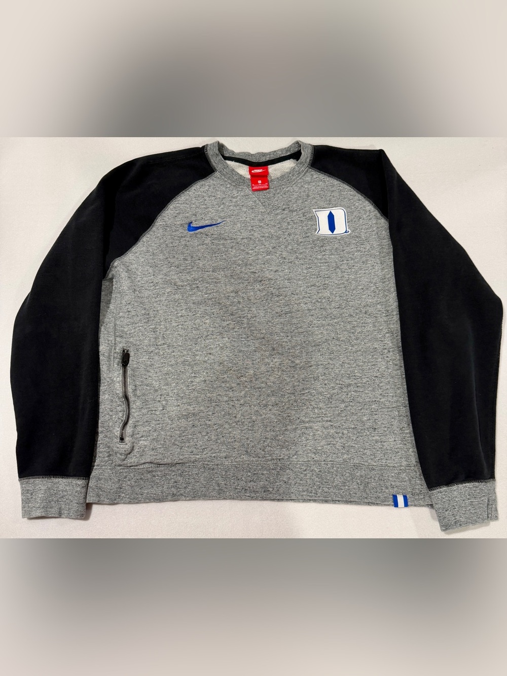 Nike Men’s Gray Crewneck Sweatshirt with Black Sleeves & Blue Accents